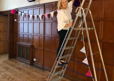 Hilary getting the hall ready for an event